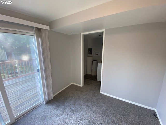 681 SE Neptune Ave, Lincoln City, OR 97367 - unfurnished room with carpet flooring and baseboards