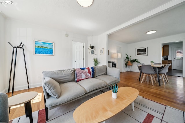 2055 N Alberta St, Portland, OR 97217 - living area featuring wood finished floors and baseboards