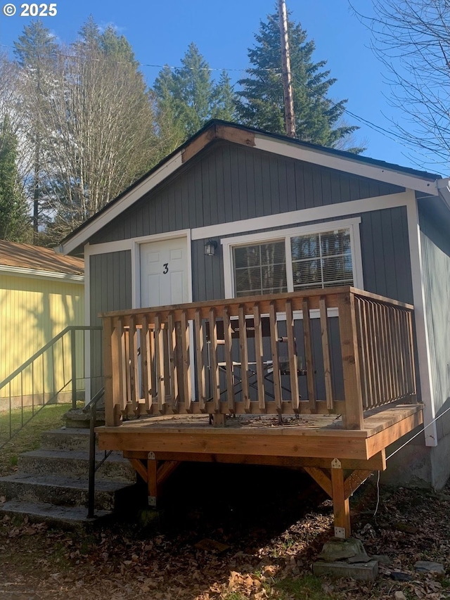 rear view of property with a deck