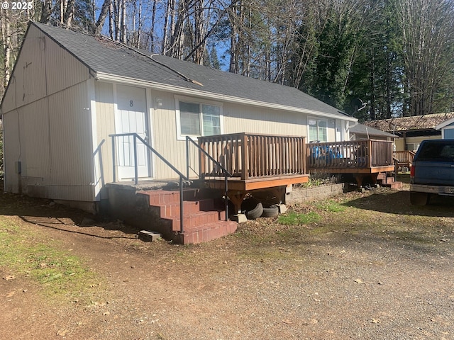 view of front facade featuring a wooden deck