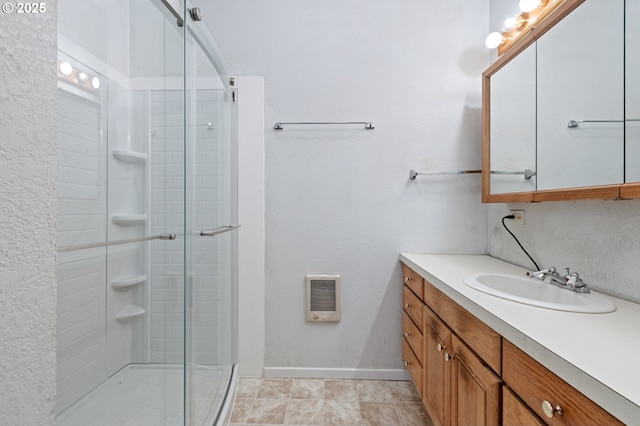 2170 Hubbard Creek Rd, Umpqua, OR 97486 - bathroom featuring vanity, a shower stall, and heating unit