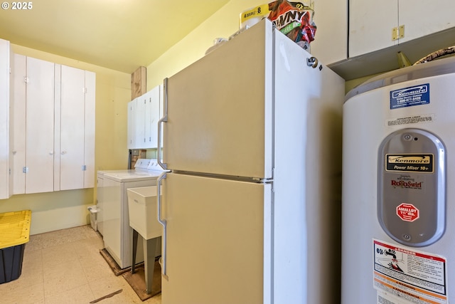 2170 Hubbard Creek Rd, Umpqua, OR 97486 - laundry area featuring cabinet space, independent washer and dryer, water heater, and light flooring