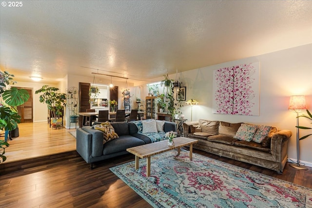 5770 SW Cranberry Ct, Beaverton, OR 97007 - living room featuring a textured ceiling and dark wood-style flooring