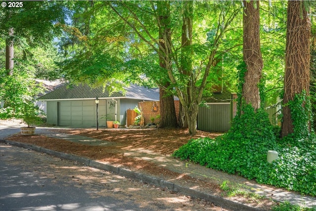 5770 SW Cranberry Ct, Beaverton, OR 97007 - view of front of home featuring driveway and a garage