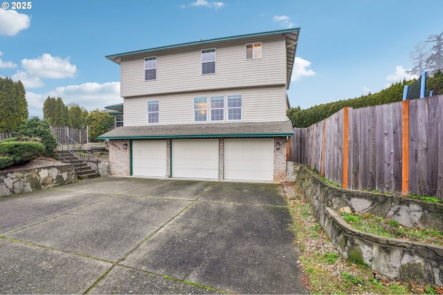 exterior space with a garage