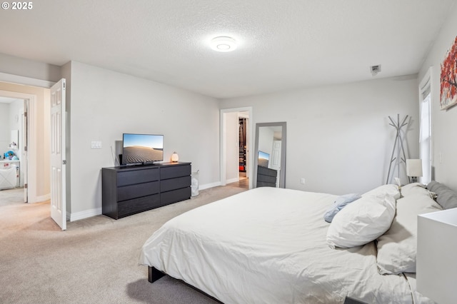 carpeted bedroom with a textured ceiling