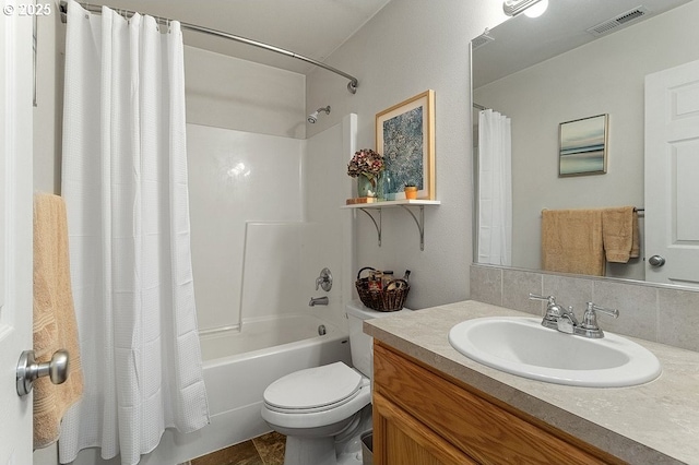 full bath featuring visible vents, shower / bath combo with shower curtain, toilet, and vanity