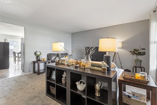 office space with light colored carpet and baseboards