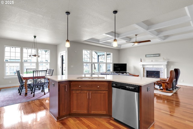 323 Argon Ave, Eugene, OR 97404 - kitchen with dishwasher, light wood-style floors, light countertops, a ceiling fan, and coffered ceiling