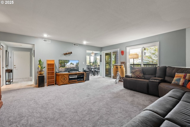 48 Eagle Crest Dr Unit 2E, Lake Oswego, OR 97035 - living room featuring visible vents, recessed lighting, and carpet flooring