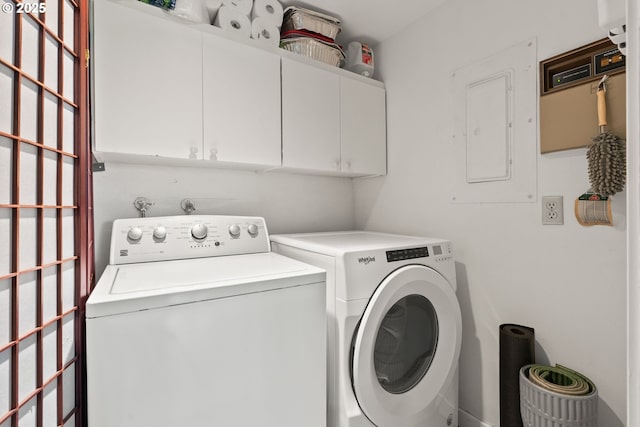48 Eagle Crest Dr Unit 2E, Lake Oswego, OR 97035 - laundry room featuring cabinet space, electric panel, and washer and clothes dryer