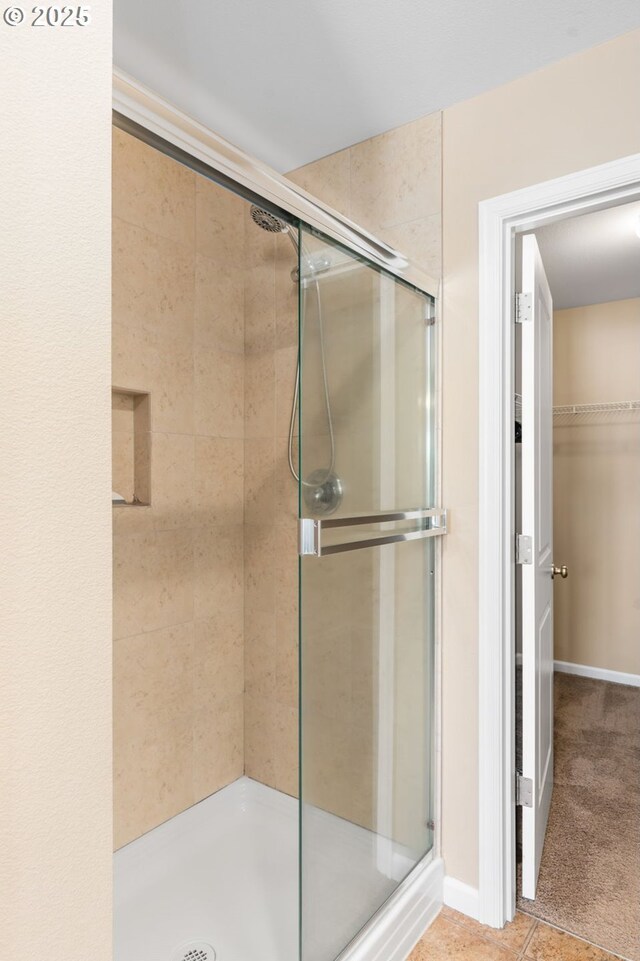 4077 SE Lone Oak St, Hillsboro, OR 97123 - bathroom featuring healthy amount of natural light, ensuite bath, a garden tub, and double vanity