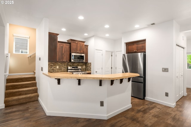 4077 SE Lone Oak St, Hillsboro, OR 97123 - hallway featuring dark wood-type flooring, recessed lighting, and baseboards
