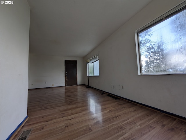 10539 NW 3rd St, Portland, OR 97231 - unfurnished room featuring wood finished floors and baseboards
