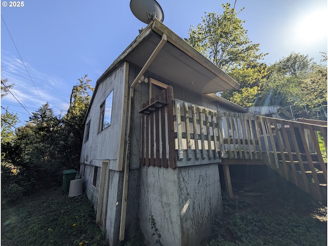 10539 NW 3rd St, Portland, OR 97231 - view of side of property with a wooden deck