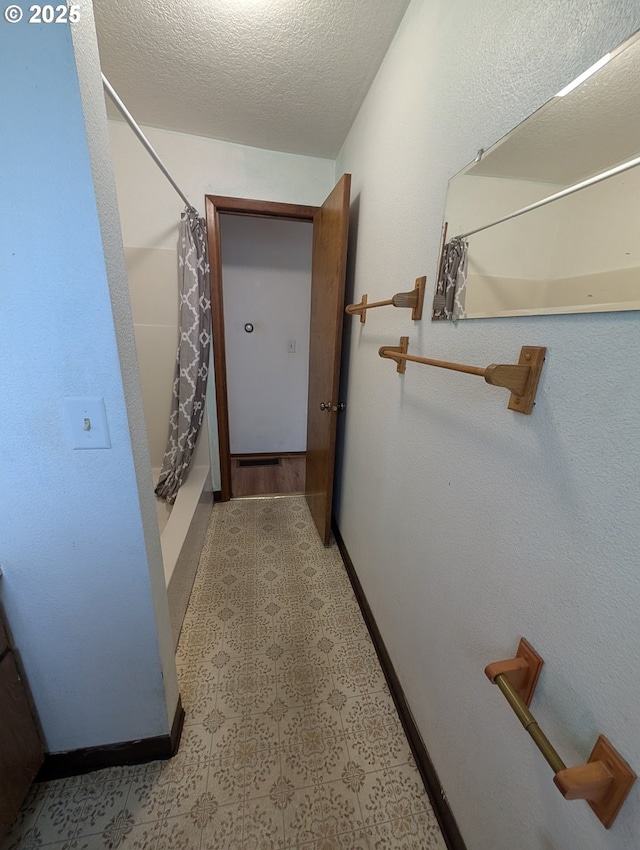 10539 NW 3rd St, Portland, OR 97231 - hall with a textured ceiling and baseboards