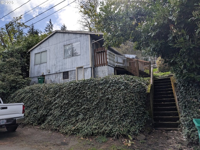 10539 NW 3rd St, Portland, OR 97231 - view of side of home with stairs