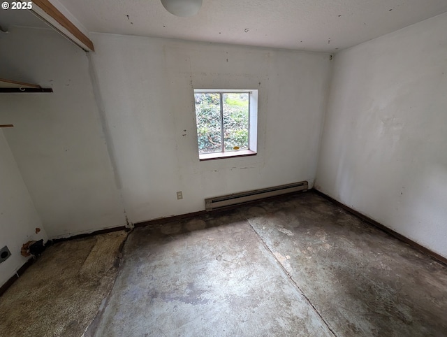 10539 NW 3rd St, Portland, OR 97231 - unfurnished room with baseboard heating and concrete floors