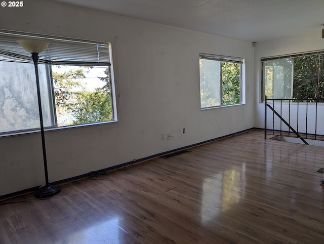 10539 NW 3rd St, Portland, OR 97231 - spare room featuring wood finished floors and baseboards