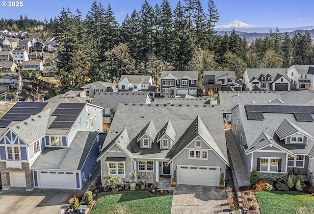 aerial view with a mountain view and a residential view