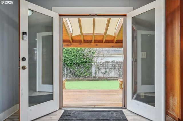 doorway to outside featuring wood finished floors