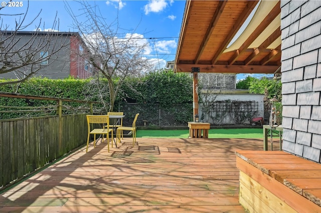 wooden deck featuring fence