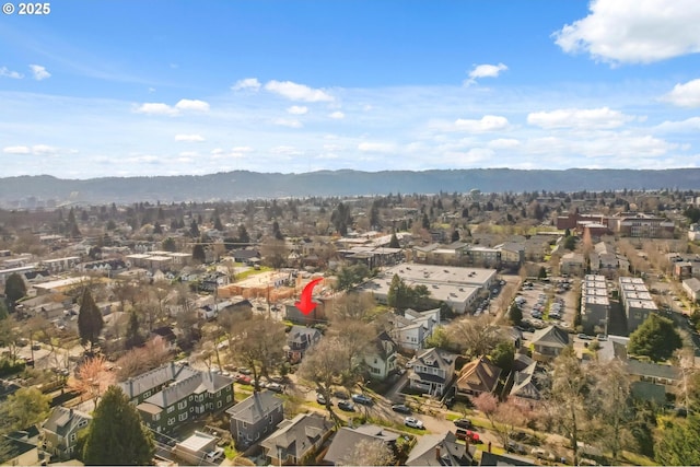 birds eye view of property featuring a residential view and a mountain view