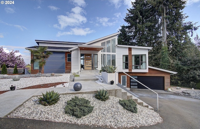 modern home featuring a garage