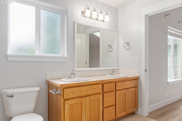 2795 Mallory Ln, Eugene, OR 97401 - bathroom featuring toilet and double vanity
