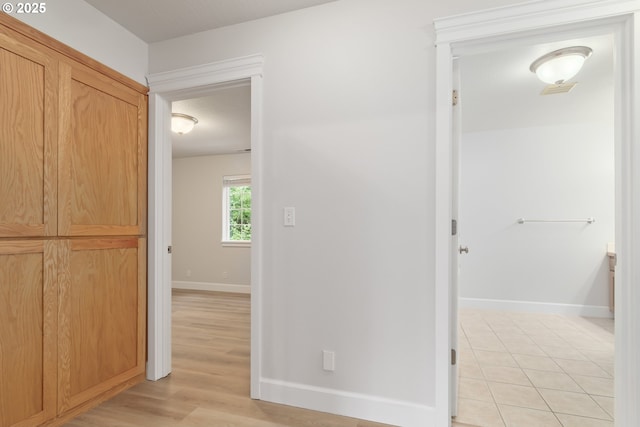 2795 Mallory Ln, Eugene, OR 97401 - hallway featuring baseboards and light wood-style flooring