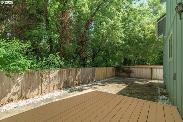 2795 Mallory Ln, Eugene, OR 97401 - wooden deck with a fenced backyard and a patio area