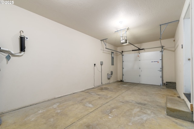 2795 Mallory Ln, Eugene, OR 97401 - garage featuring a garage door opener and electric panel