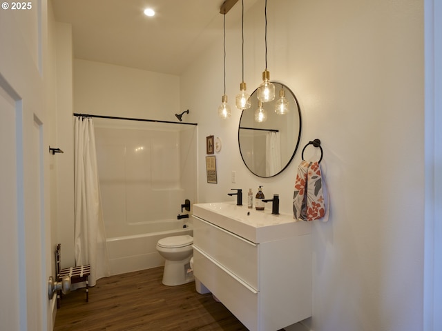 159 Bootjack Ln, Rose Valley, WA 98626 - bathroom with vanity, toilet, wood finished floors, shower / bath combo, and radiator