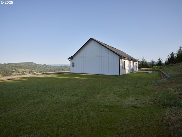 159 Bootjack Ln, Rose Valley, WA 98626 - view of side of home featuring a lawn, board and batten siding, and a mountain view