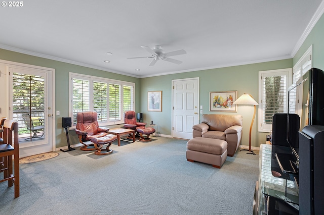 carpeted living room featuring baseboards, ornamental molding, ceiling fan, and recessed lighting