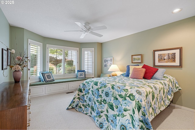 bedroom featuring carpet floors, a ceiling fan, recessed lighting, and baseboards