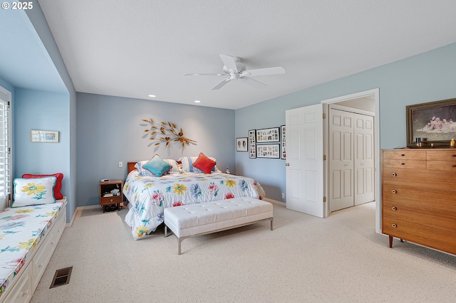 bedroom featuring recessed lighting, baseboards, a ceiling fan, and light carpet