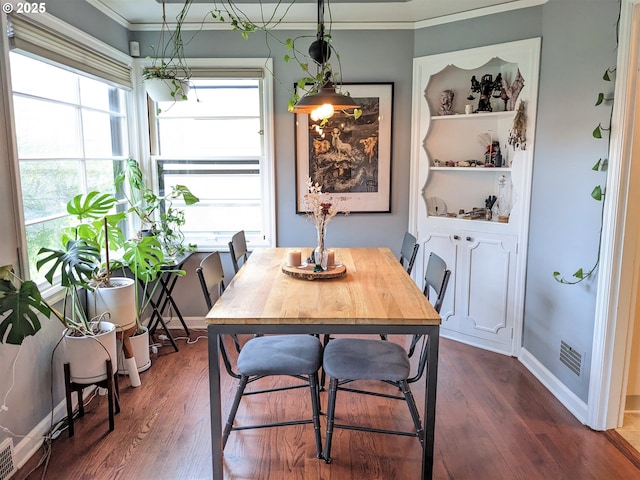 4621 NE 37th Ave, Portland, OR 97211 - dining area with dark wood-style floors, ornamental molding, and baseboards