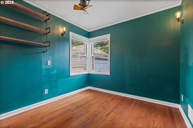 4621 NE 37th Ave, Portland, OR 97211 - spare room featuring ceiling fan, wood finished floors, ornamental molding, and baseboards