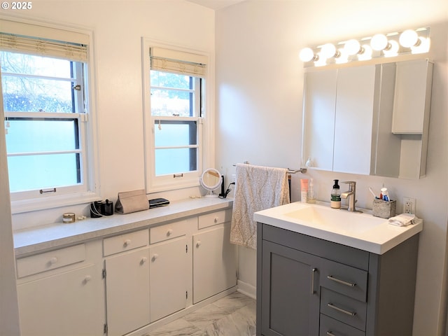 4621 NE 37th Ave, Portland, OR 97211 - bathroom with vanity and marble finish flooring