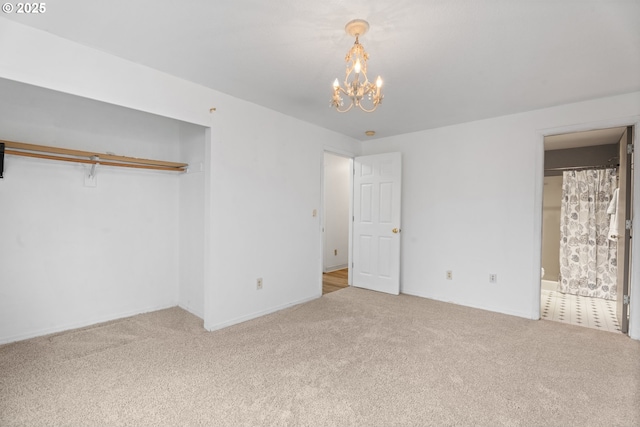 13816 NE 85th St, Vancouver, WA 98682 - unfurnished bedroom with carpet, a chandelier, baseboards, ensuite bath, and a closet