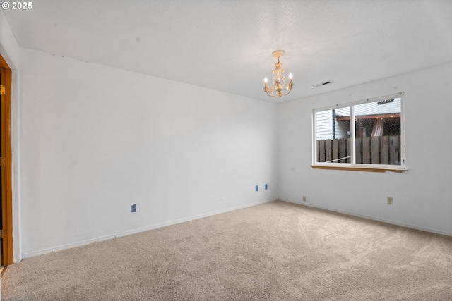 13816 NE 85th St, Vancouver, WA 98682 - carpeted spare room with a chandelier and baseboards