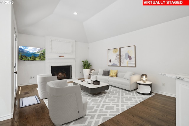 12723 Adrian Ct, Lake Oswego, OR 97034 - living room with wood finished floors, a brick fireplace, lofted ceiling, and recessed lighting