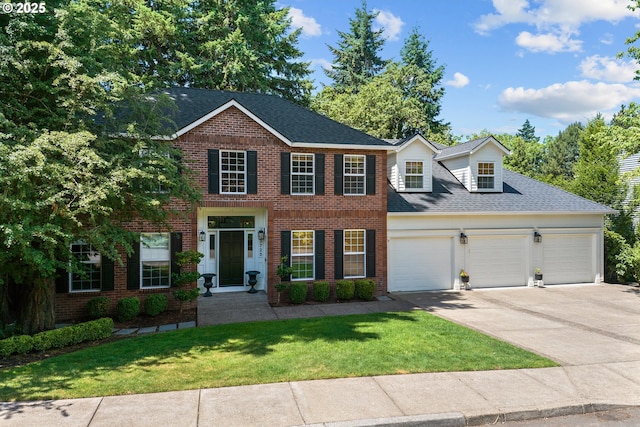 12723 Adrian Ct, Lake Oswego, OR 97034 - view of front of home with brick siding, concrete driveway, an attached garage, a front lawn, and roof with shingles
