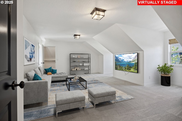 12723 Adrian Ct, Lake Oswego, OR 97034 - living room featuring a textured ceiling, carpet, and vaulted ceiling