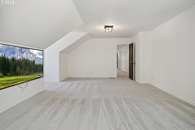 12723 Adrian Ct, Lake Oswego, OR 97034 - additional living space featuring light carpet and baseboards