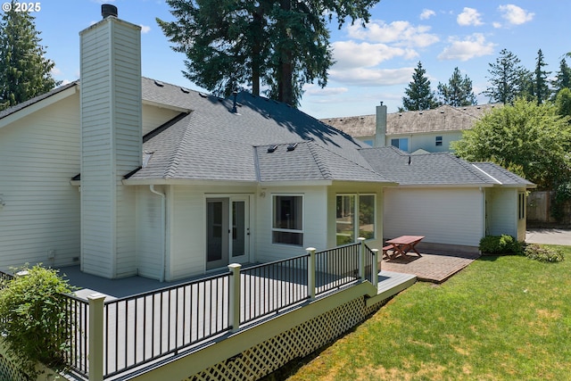 12723 Adrian Ct, Lake Oswego, OR 97034 - back of property featuring a chimney, a deck, a yard, and a shingled roof