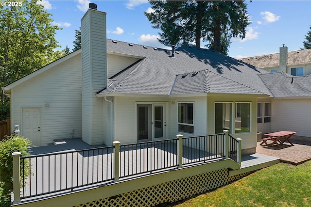12723 Adrian Ct, Lake Oswego, OR 97034 - back of property with a shingled roof, a deck, and a chimney