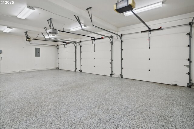 12723 Adrian Ct, Lake Oswego, OR 97034 - garage featuring electric panel and a garage door opener
