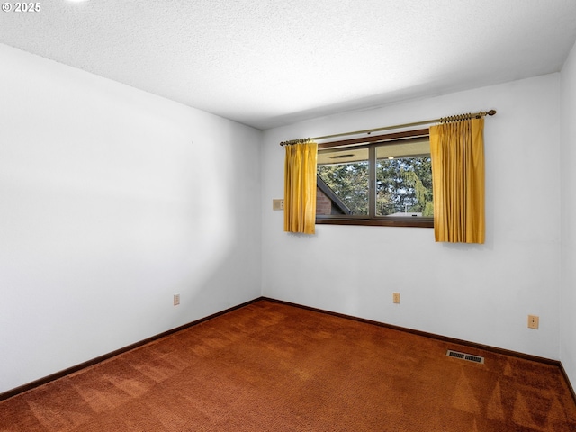 15416 NE Holladay St, Portland, OR 97230 - spare room featuring baseboards, carpet flooring, and visible vents